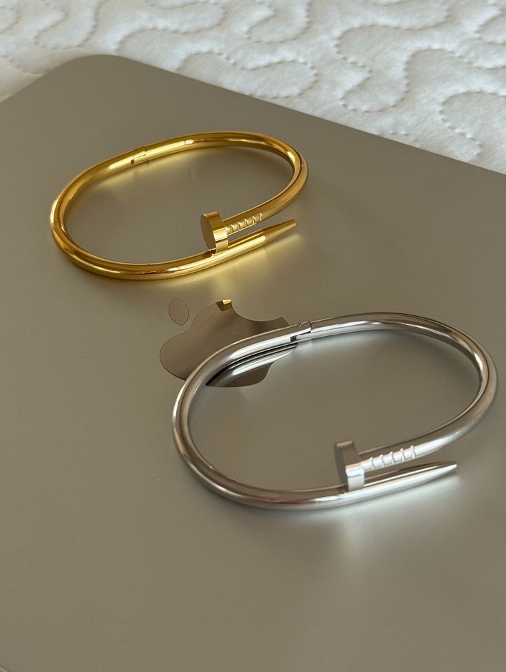 Nail Bangle Bracelet Set - gold and silver flat lay