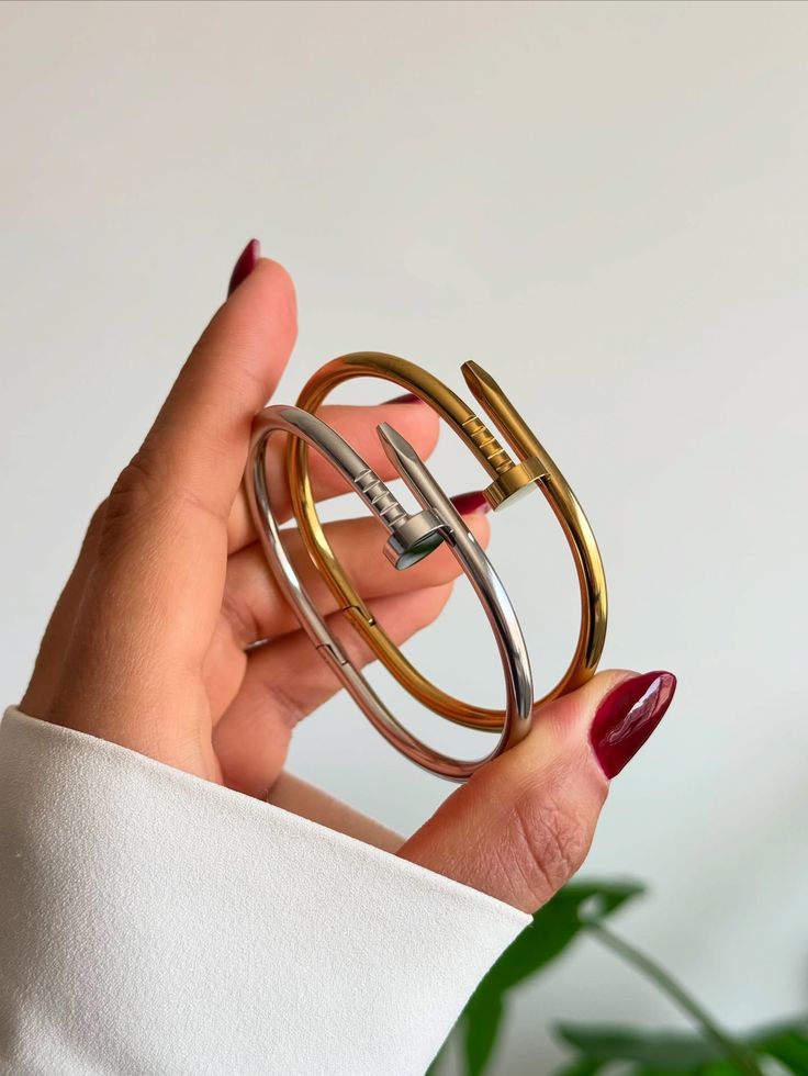 Nail Bangle Bracelet Set - hand holding both bangles